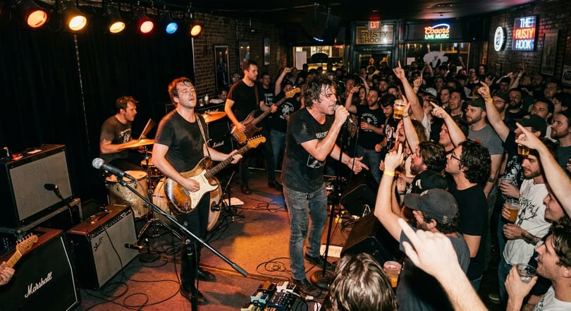 Live band performing on stage at Tony Locos bar